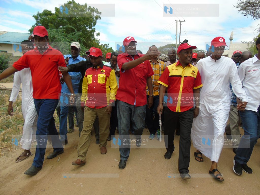 Aden Duale (center) with Garissa County gubernatorial aspirant Ali Bunow Korane (right)