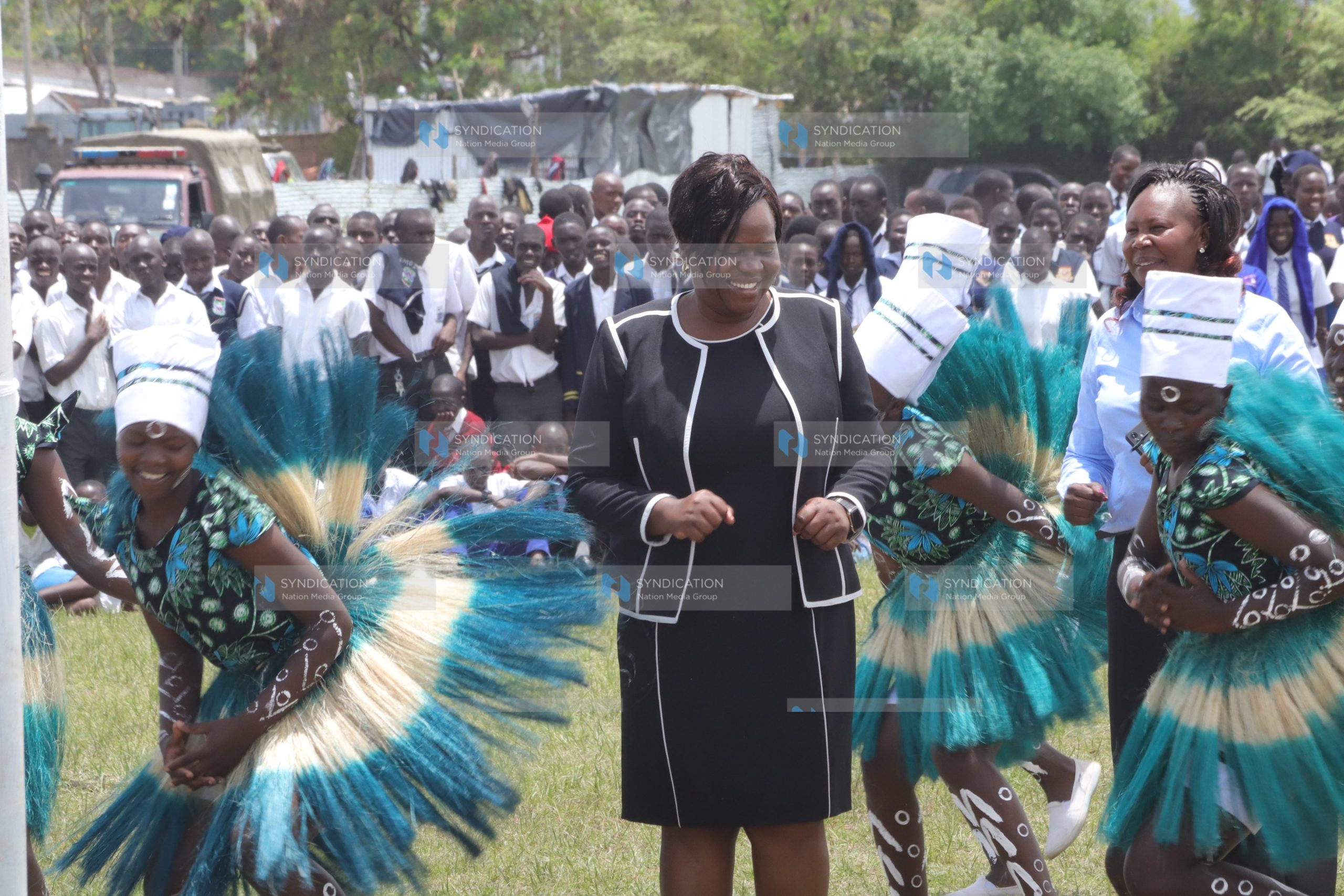 Gladys Wanga dances alongside Ogande Mixed Secondary school dancers