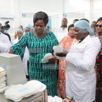 Homa Bay Governor Gladys Wanga samples locally made sanitary towels