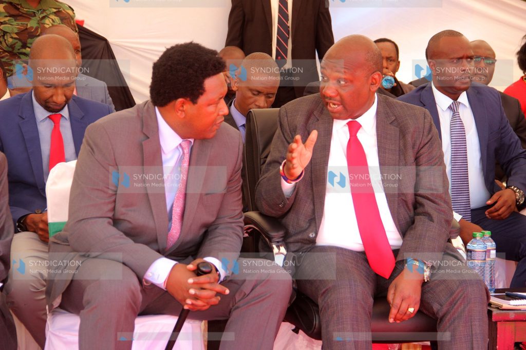 Narok county governor Samuel Tunai has a chat with county Senator Ledama Ole Kina