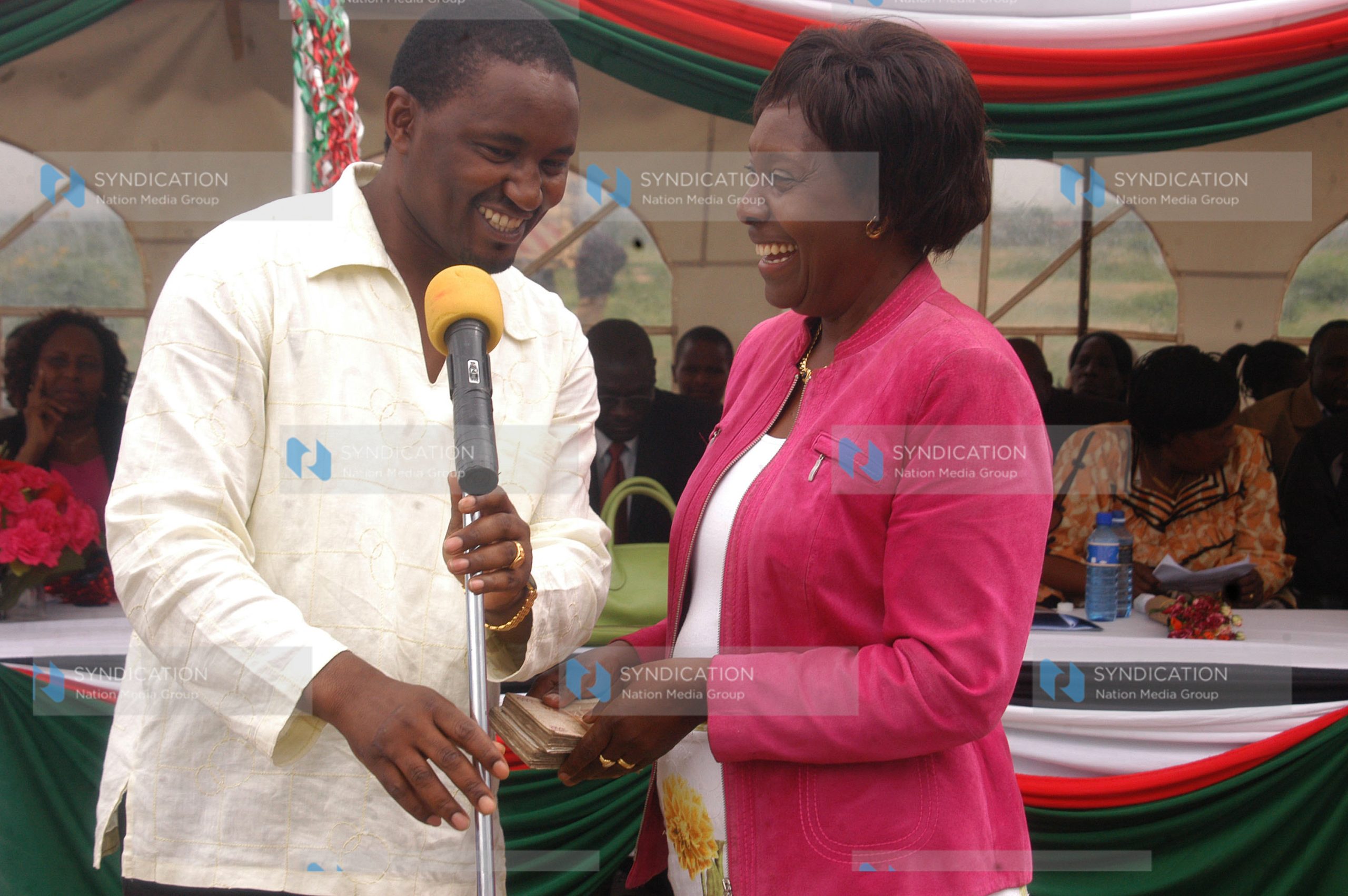 Water Minister Charity Ngilu gives donation to her assistant Mwangi Kiunjuri