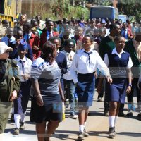 Nyeri residents and students from various schools participate in a peace walk