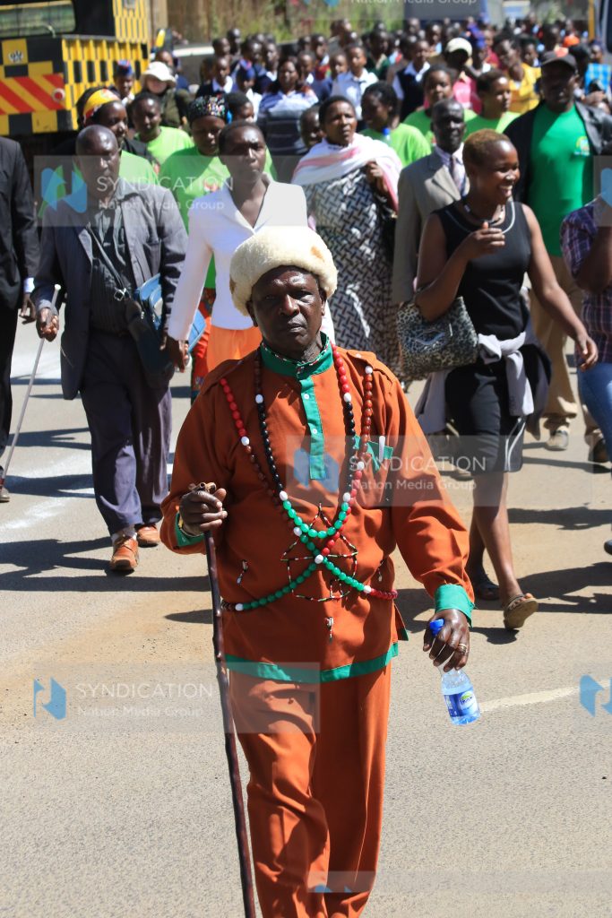 Nyeri residents and students from various schools participate in a peace walk
