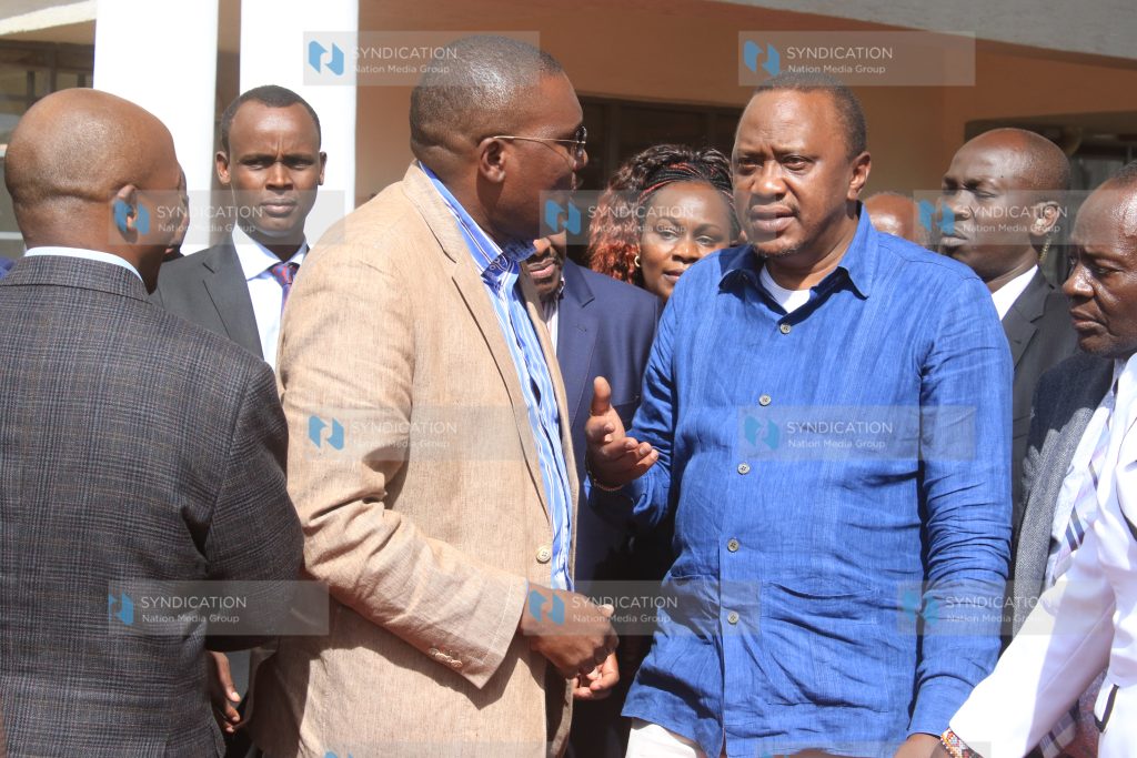 President Uhuru Kenyatta speaks with Mukurweini MP