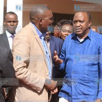 President Uhuru Kenyatta speaks with Mukurweini MP