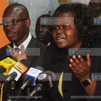 Homabay women rep Gladys Wanga flanked by Moses Kajwang'
