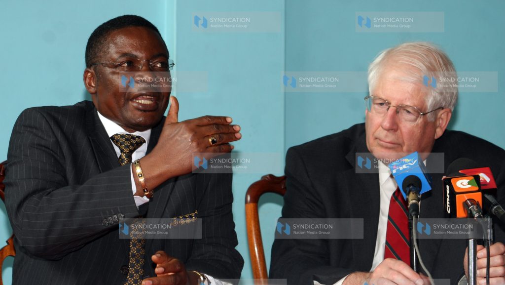 House Speaker Kenneth Marende (left) gestures during a media briefing