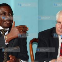 House Speaker Kenneth Marende (left) gestures during a media briefing