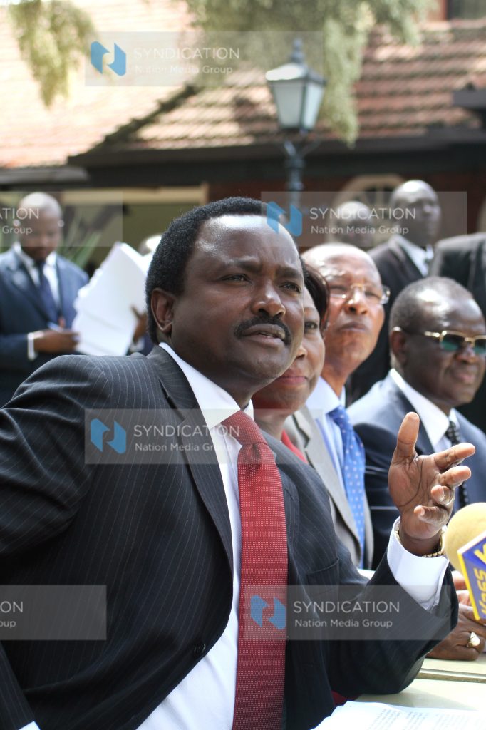 Vice President Kalonzo Musyoka (left) gestures during a press conference