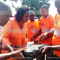 Homa Bay Woman Representative Gladys Wanga presents toolbox to mechanics