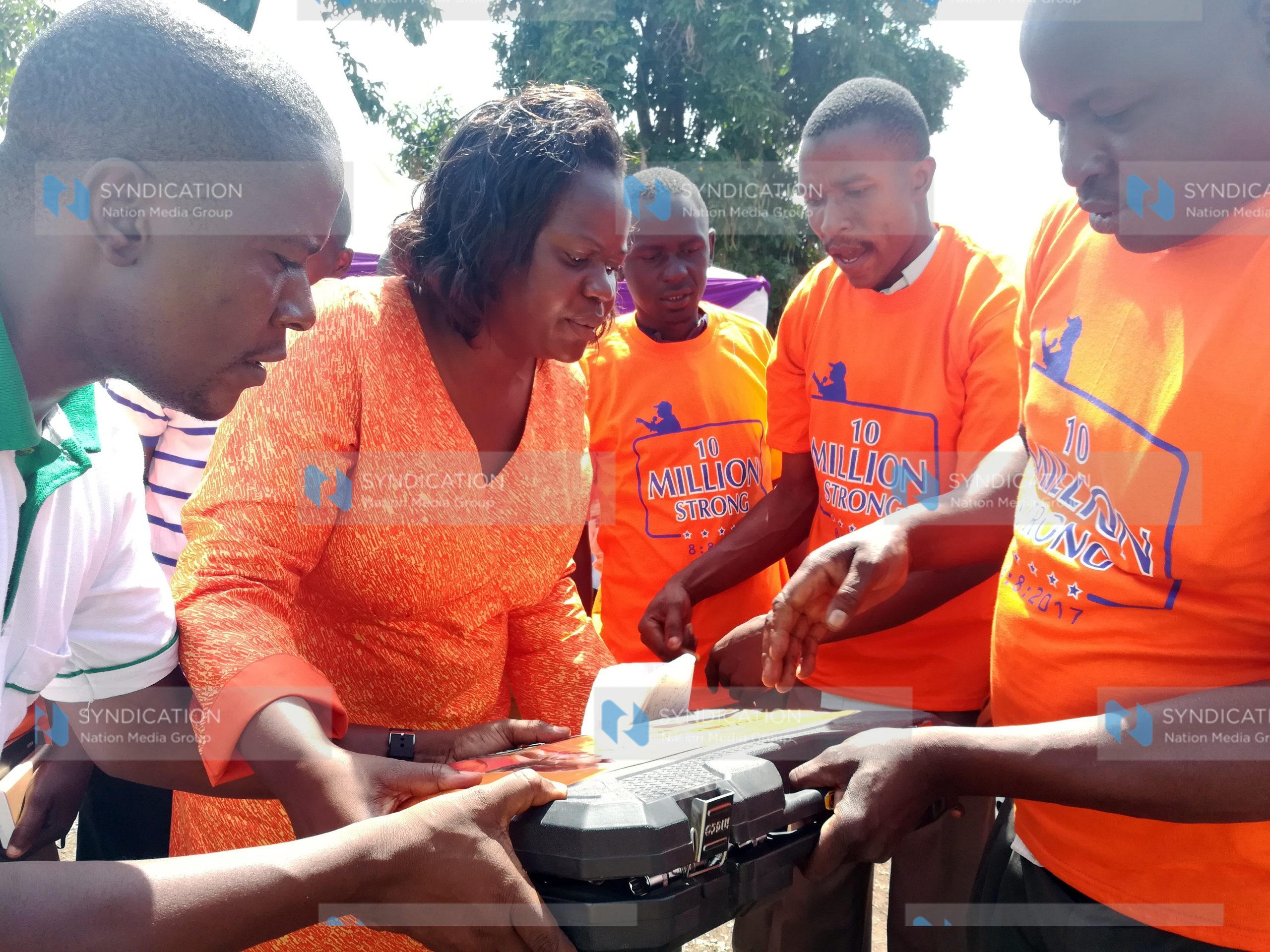 Homa Bay Woman Representative Gladys Wanga presents toolbox to mechanics