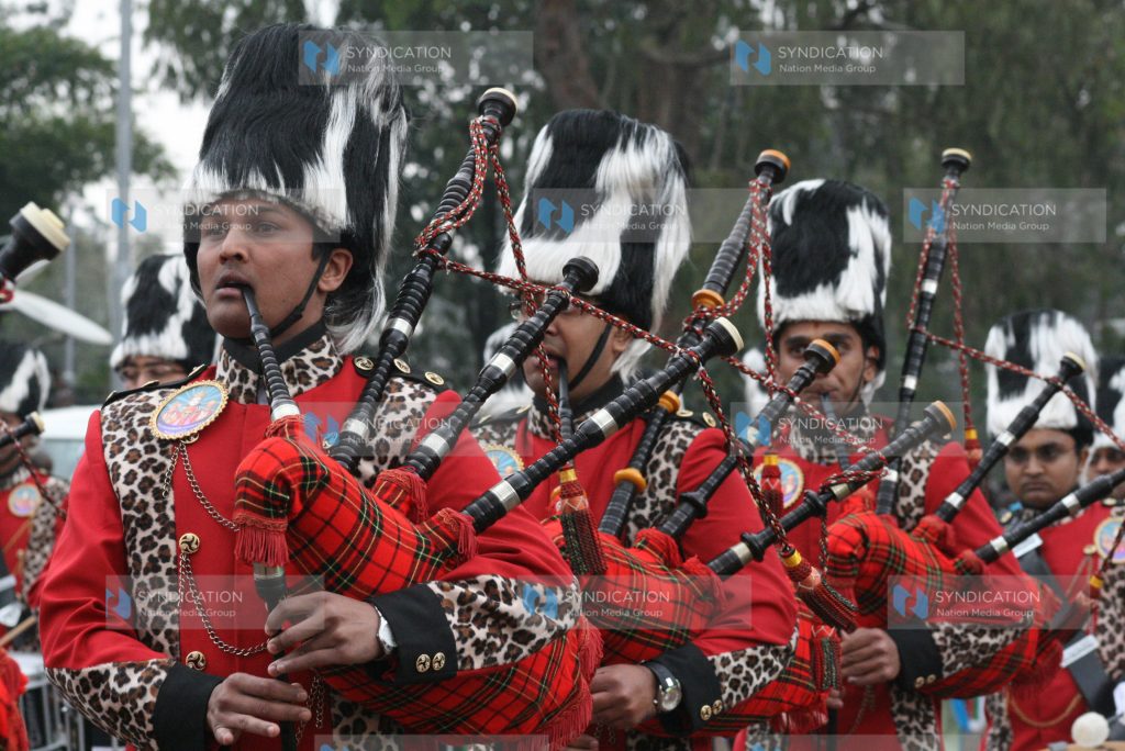 Singers sing during the promulgation of the new constitution ceremony