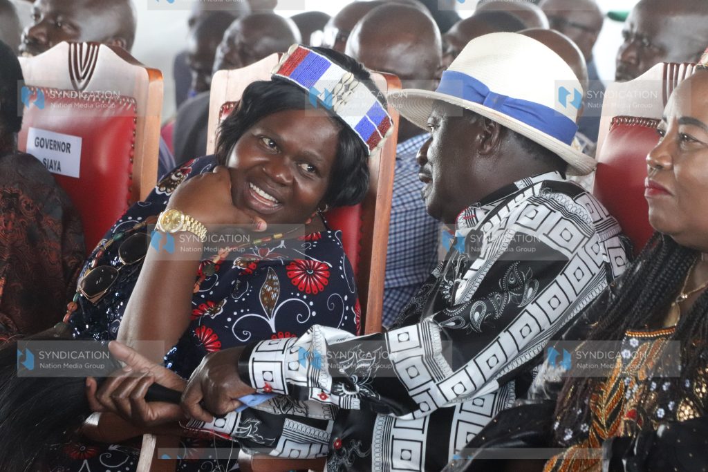 Azimio la Umoja One Kenya coalition party leader Raila Odinga converse with Homa Bay Governor Gladys Wanga