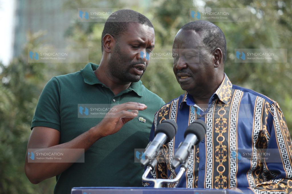 Raila Odinga and Nairobi Senator Edwin Sifuna (left)