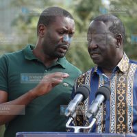 Raila Odinga and Nairobi Senator Edwin Sifuna (left)