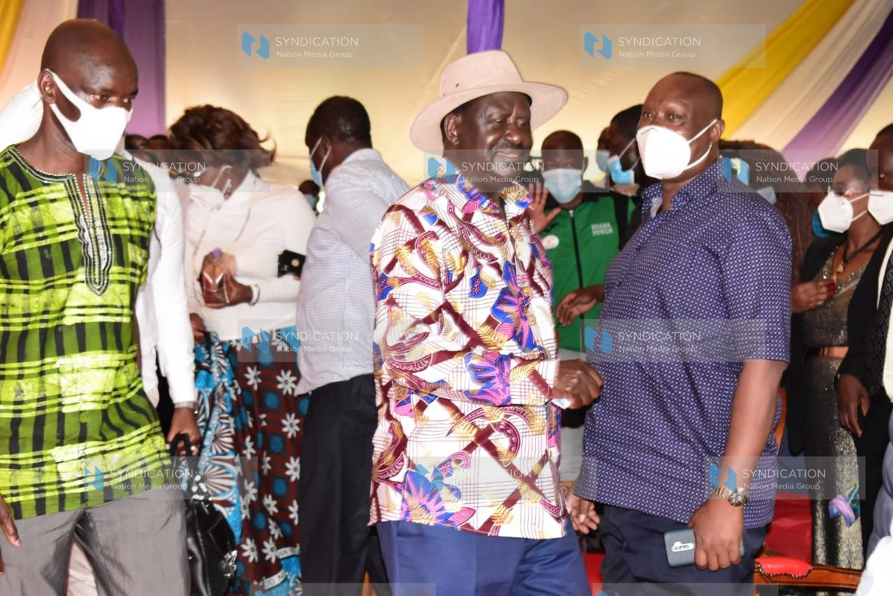 ODM leader Raila Odinga with Busia Governor Sospeter Ojaamong