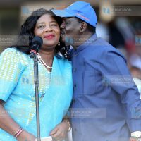 Raila Odinga pecks his wife Ida Odinga
