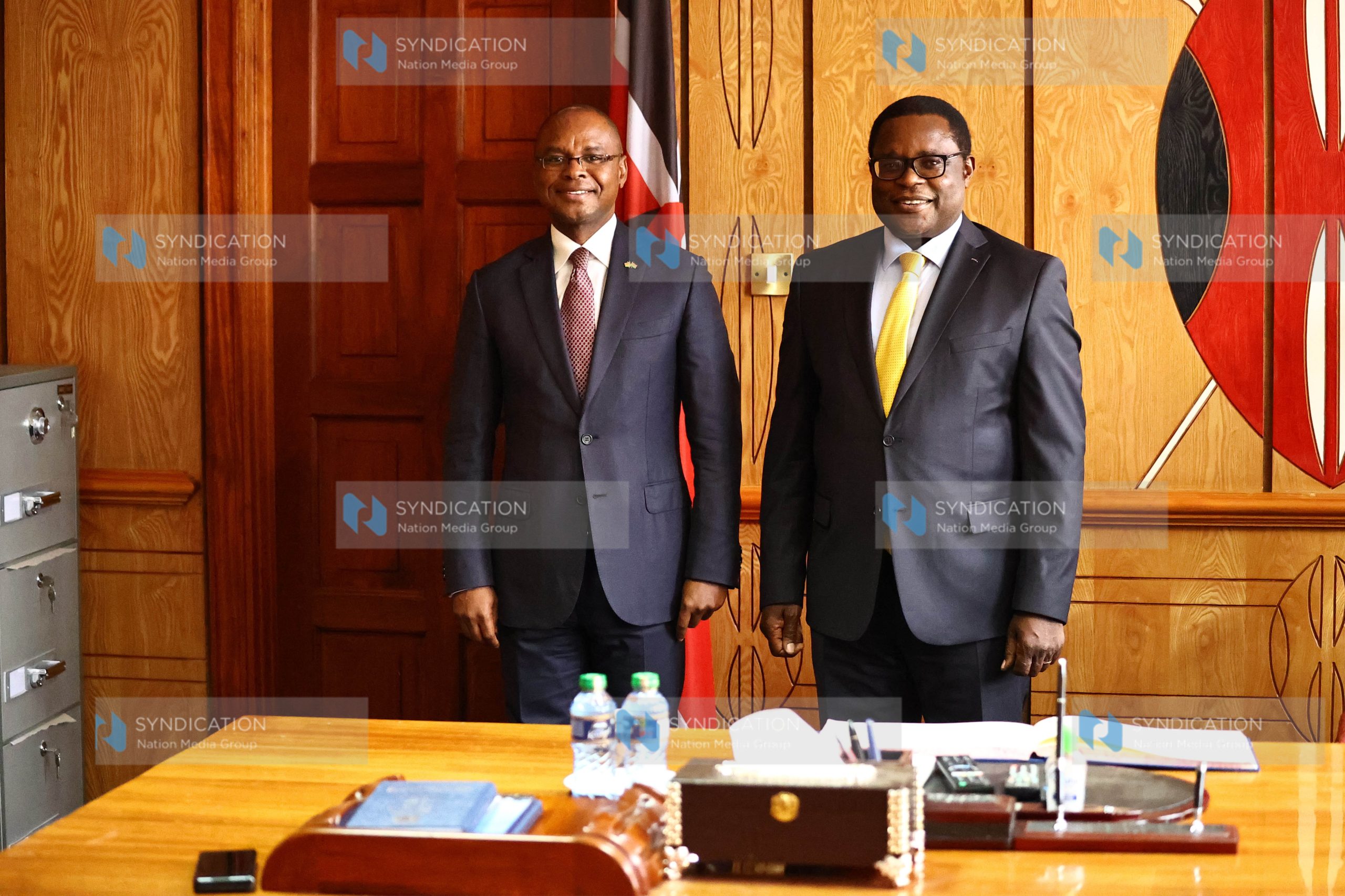 Outgoing Senate Speaker Kenneth Lusaka welcomes incoming speaker Amason Kingi