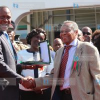 President Uhuru Kenyatta awarding Benson Kaaria with the prestigious 50 years Agriculture Society of Kenya Lifetime Award