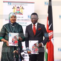 Outgoing CS Amina Mohamed with Incoming Sports CS Ababu Namwamba