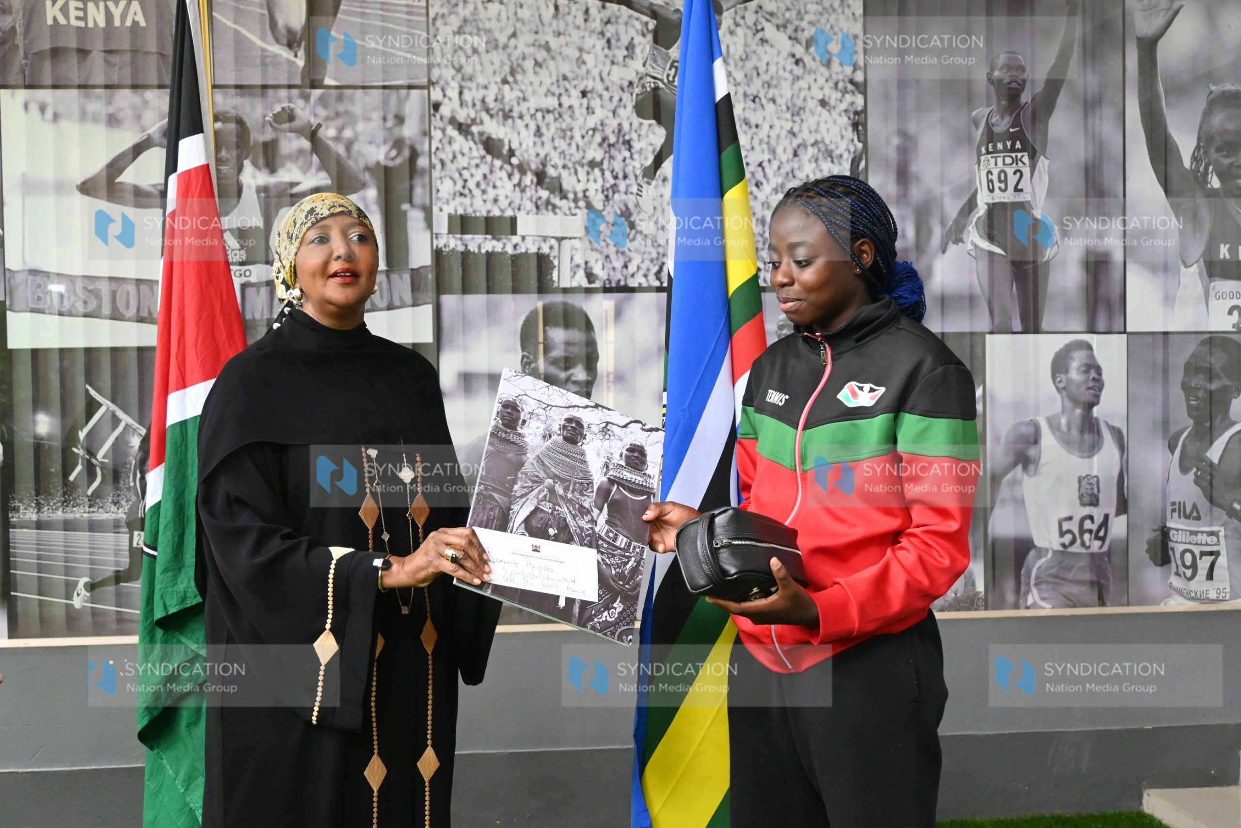 Sports Cabinet Secretary Amb Amina Mohamed gift Angela Okutoyi