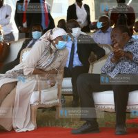 President Uhuru Kenyatta haves a chat with Sports Cabinet Secretary Amina Mohamed
