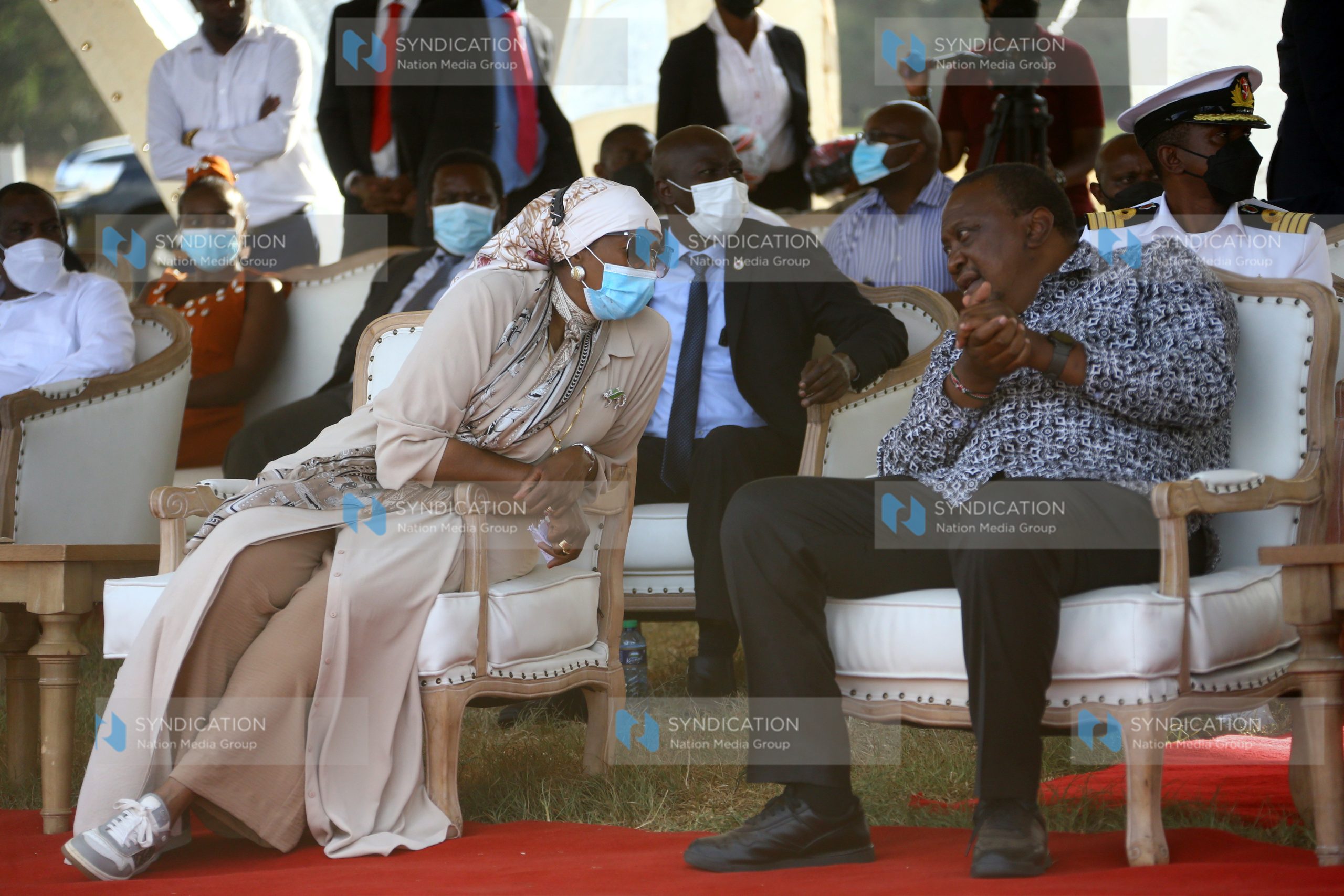 President Uhuru Kenyatta haves a chat with Sports Cabinet Secretary Amina Mohamed