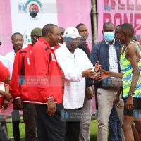 President Uhuru Kenyatta congratulates athletes