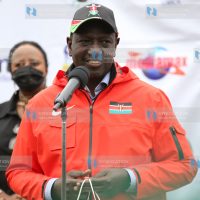 Deputy President William Ruto and Sports CS Amina Mohamed talk to Kenya Rugby team