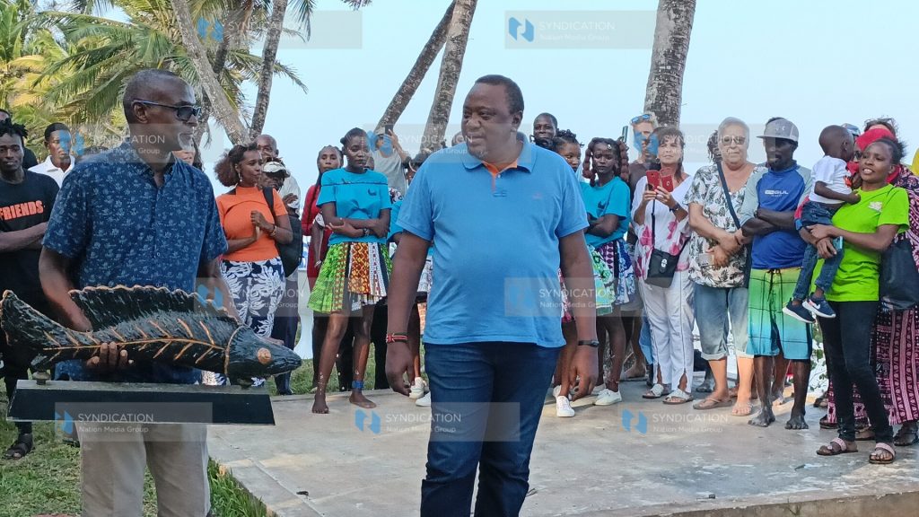 Former President Uhuru Kenyatta during the awards ceremony of the Diani Ngalawa Regatta Festival