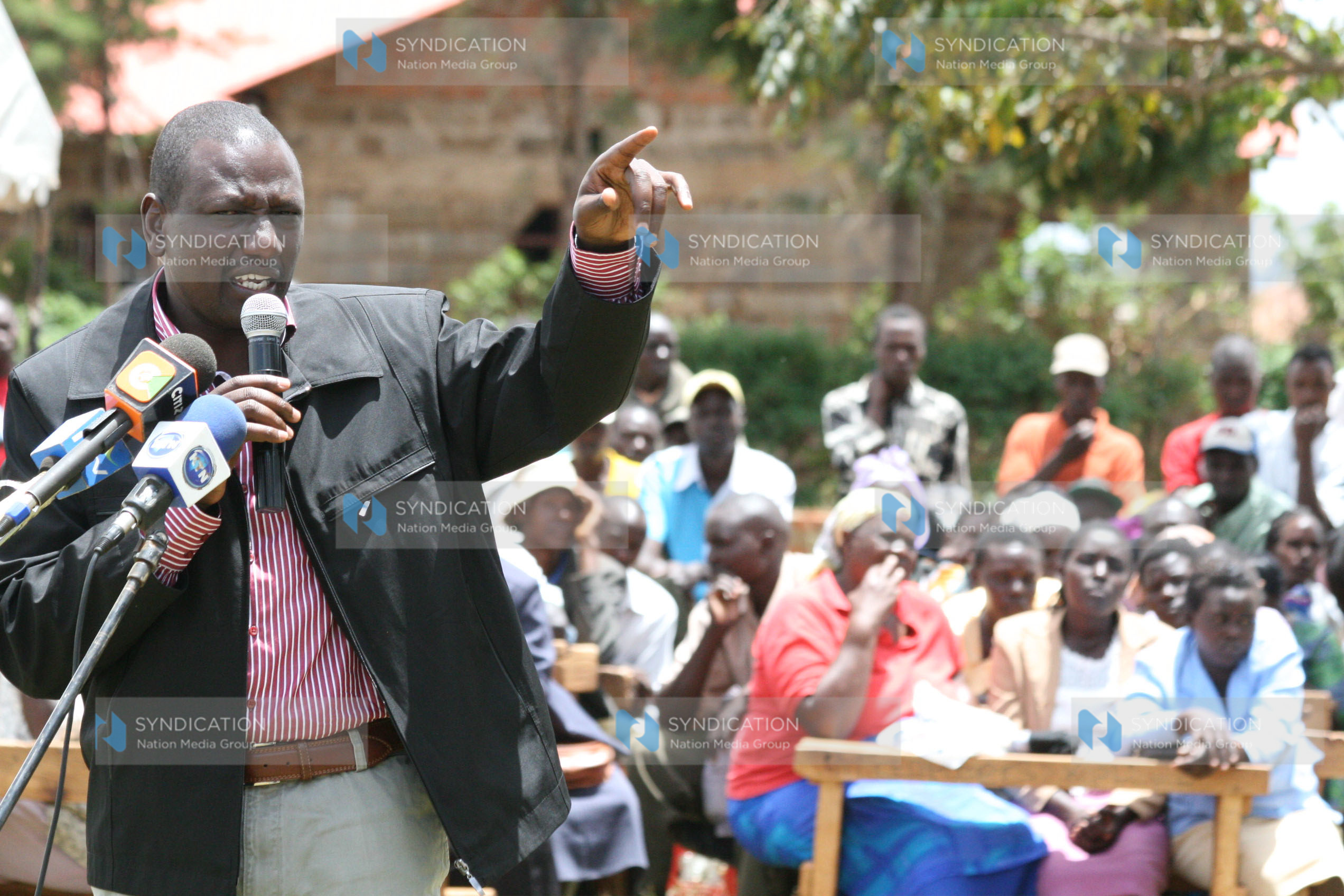 Agriculture Minister William Ruto addresses members of the public