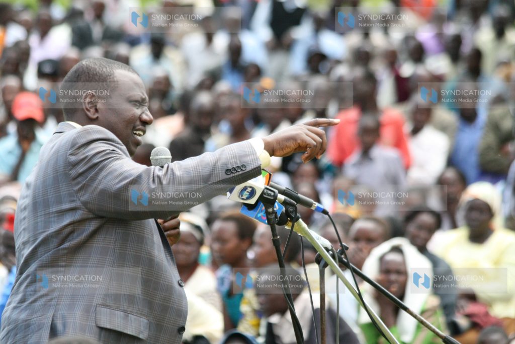 Higher Educating Minister William Ruto addresses members of the public