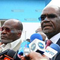 David Musila (right), flanked by Johnson Muthama, addresses a press conference