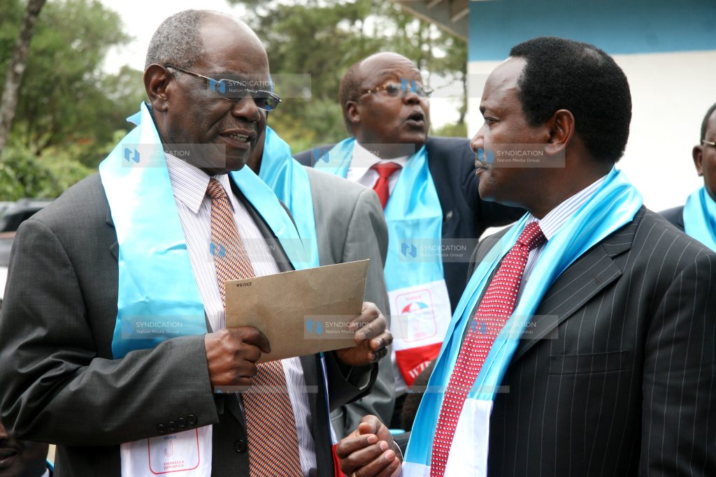 Kalonzo Musyoka (right) with the party chair David Musila(left)