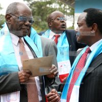 Kalonzo Musyoka (right) with the party chair David Musila(left)