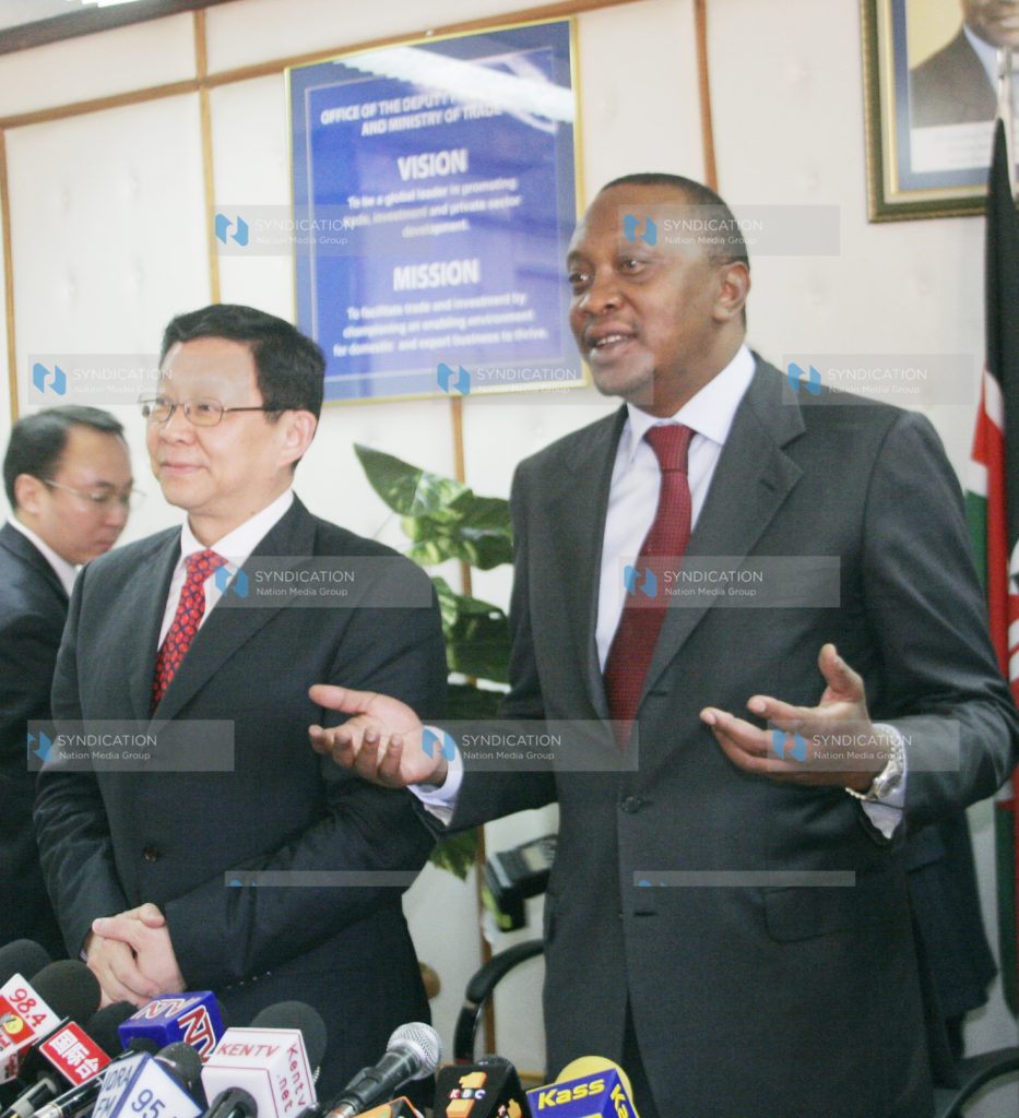 Deputy Prime Minister Uhuru Kenyatta (right) with Mr. Chen Deming, China’s Commerce Minister
