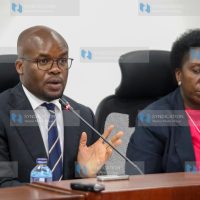 Dr. Raymond Omollo and Secretary for National Administration Beverly Opwora