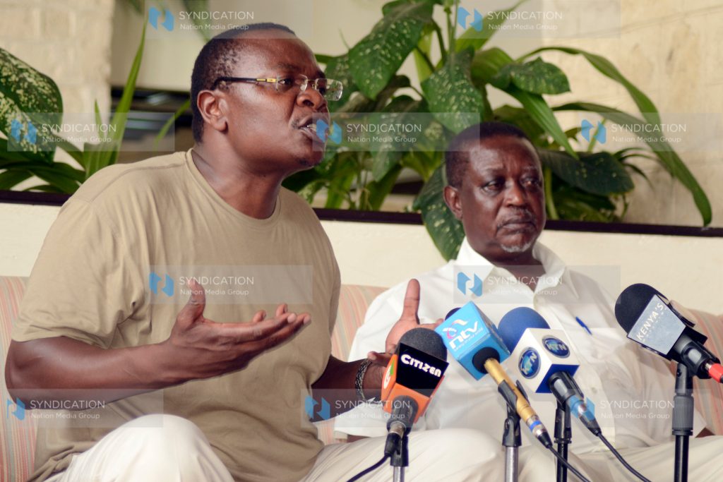 Funyula MP Paul Otuoma (left) and nominated MP Oburu Odinga addressing members of the press