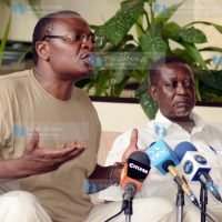 Funyula MP Paul Otuoma (left) and nominated MP Oburu Odinga addressing members of the press