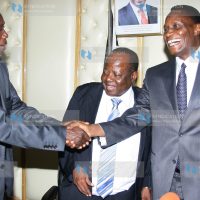 Education Cabinet Secretary Prof. Jacob Kaimenyi (Right) congratulated by Egerton University Vice Chancellor