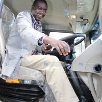 Jackson Mandago tries a TATA utility mover during its launch