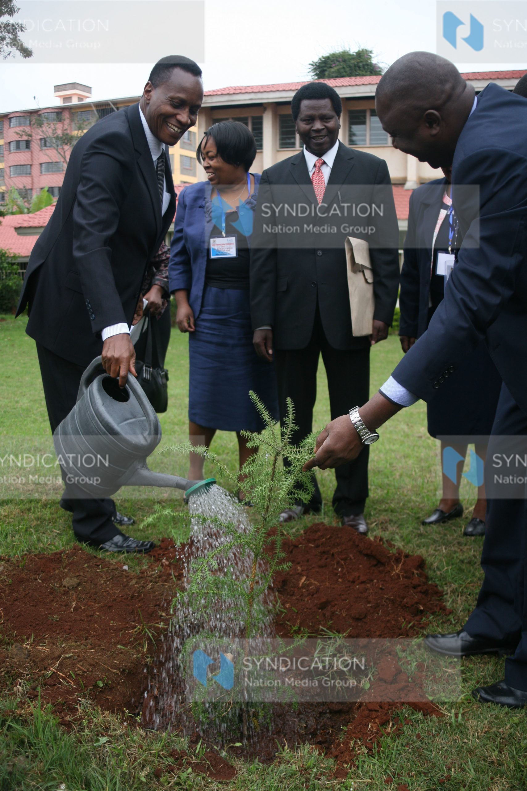 Education cabinet secretary Prof Jacob Kaimenyi waters a tree