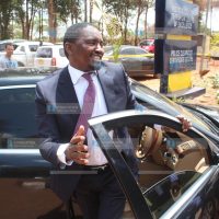 Agriculture Mwangi Kiunjuri getting out of his car