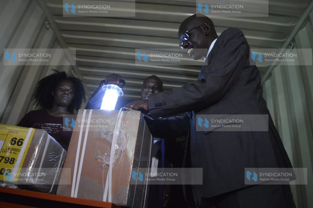 PS Education Belio Kipsang’ oversees the distribution of examination papers