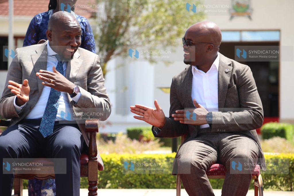 Interior Cabinet Secretary Kipchumba Murkomen confers with Principal Secretary Raymond Omollo