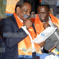 Minister for Cooperative Development Joe Nyaga has a word with MP Ababu Namwamba