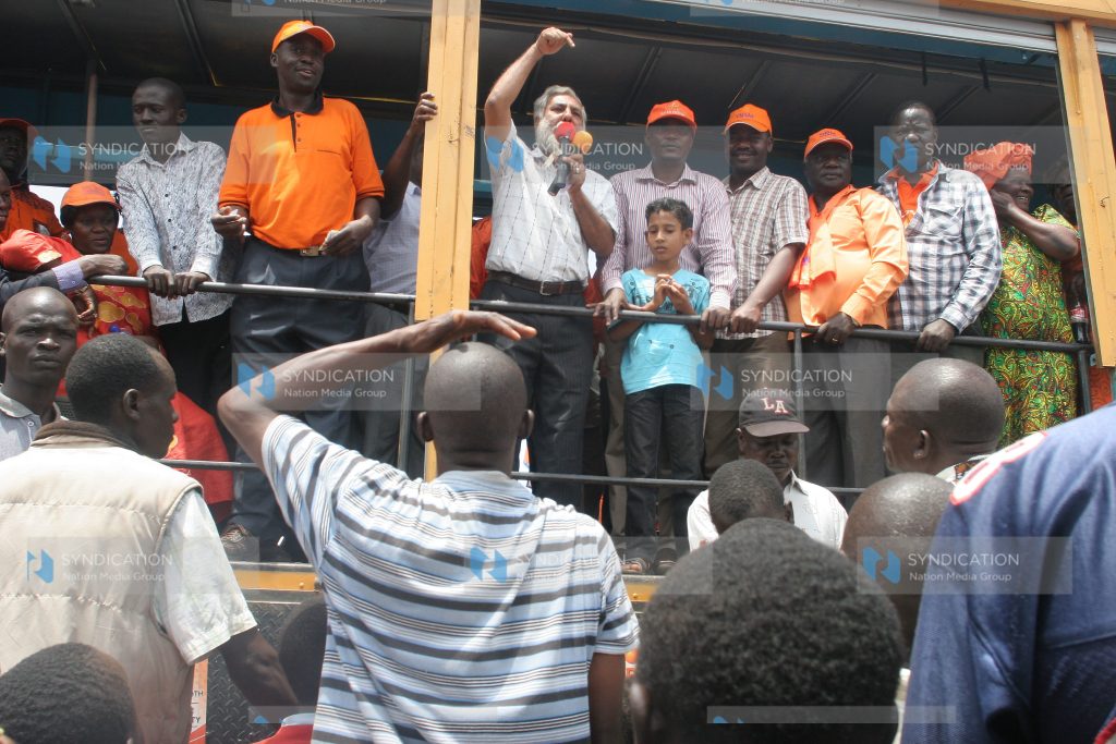 The Coalition for Reforms and Democracy team at Ndori market campaigning for their candidate Cornel Rasanga