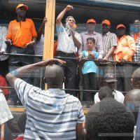 The Coalition for Reforms and Democracy team at Ndori market campaigning for their candidate Cornel Rasanga