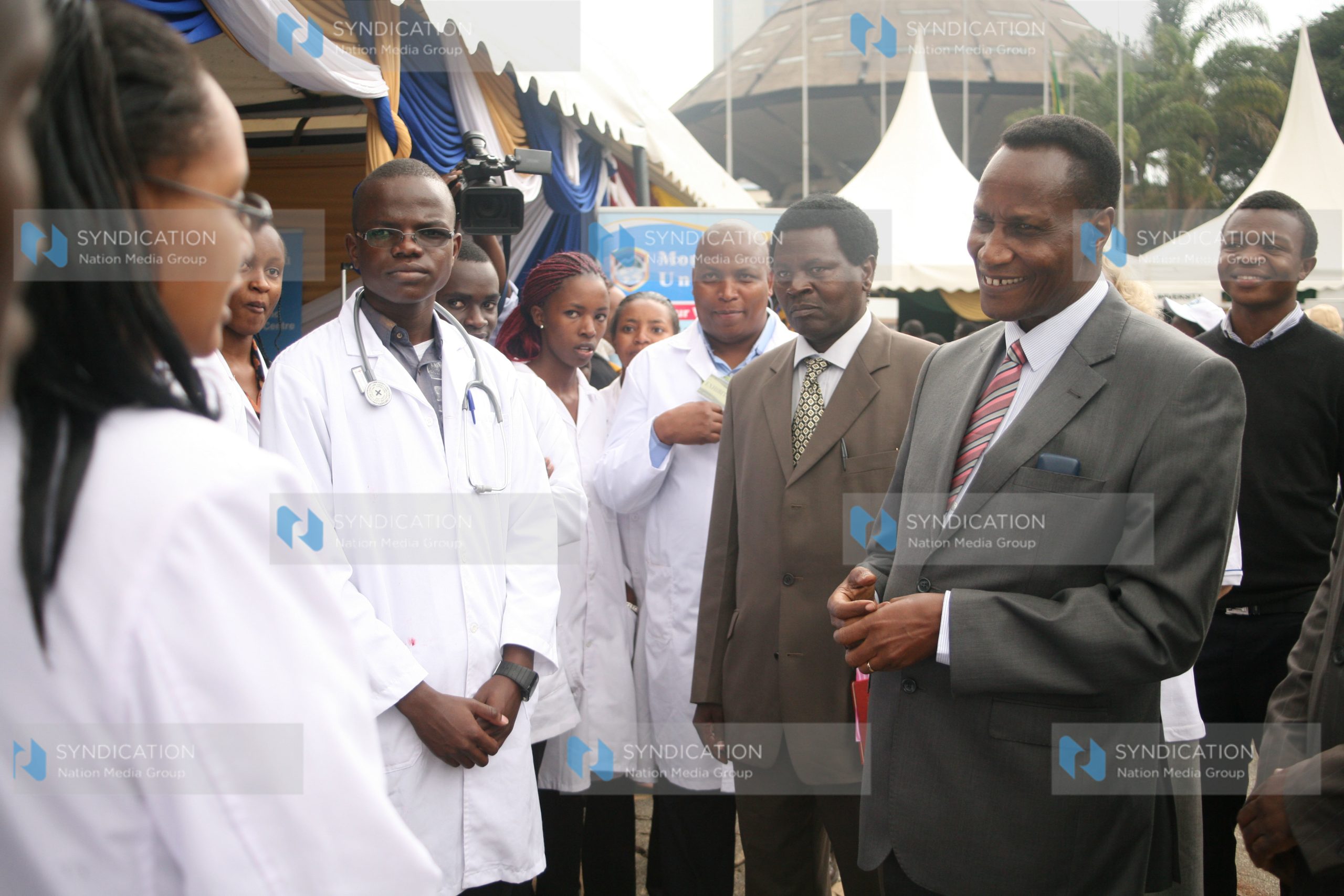 Education cabinet secretary Prof Jacob Kaimenyi talks to Mt Kenya university school of nursing students
