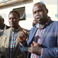 Mt Kenya Youth Caucus Chairman Linford Mutembei flanked by Lands Cabinet Secretary Jacob Kaimenyi